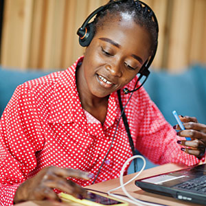 african-american-woman-works-in-a-call-center-operator